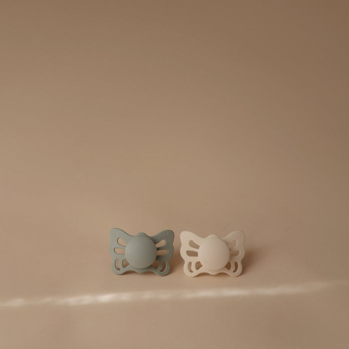 FRIGG Butterfly Anatomical Silicone Pacifier 2-Pack (0-6 Months) - Nature Baby Outfitter