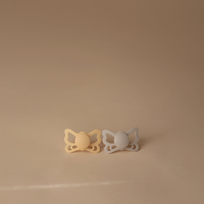 FRIGG Butterfly Anatomical Silicone Pacifier 2-Pack (6-18 Months) - Nature Baby Outfitter
