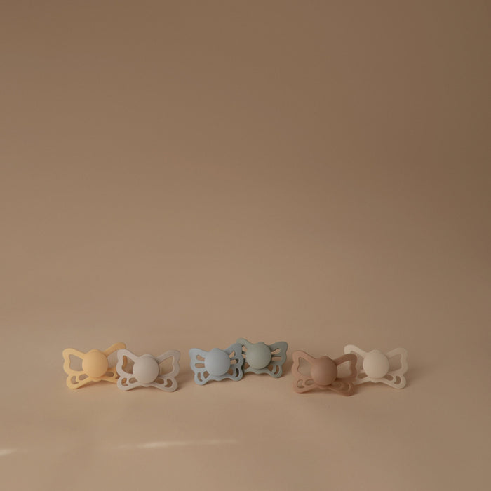 FRIGG Butterfly Anatomical Silicone Pacifier 2-Pack (6-18 Months) - Nature Baby Outfitter