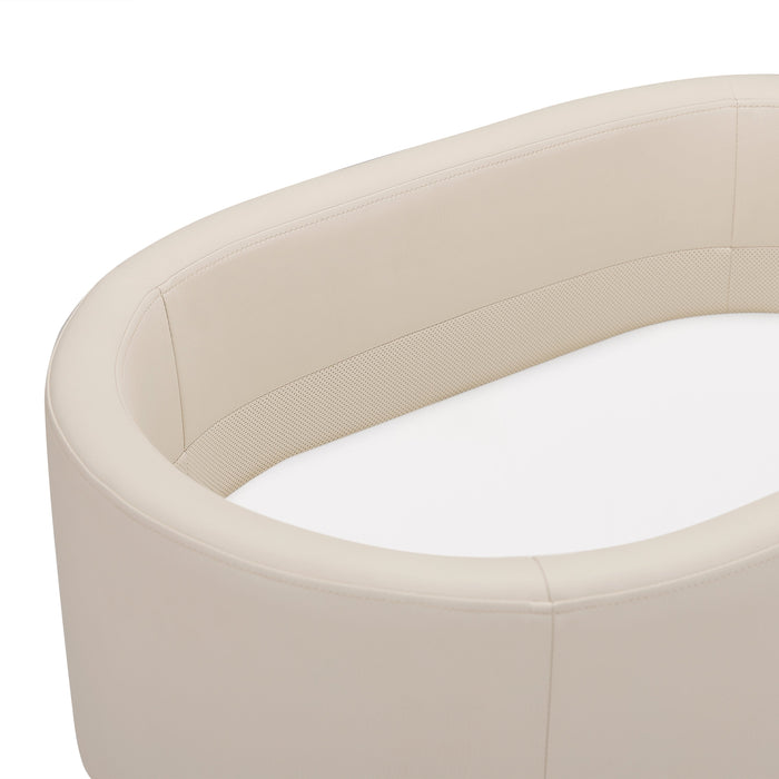 M26834GYLB,Babyletto,babyletto x GATHRE Capsule Bassinet in Ivory