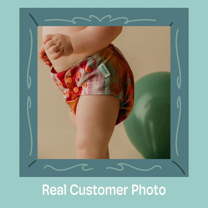 Abstract: Essentials Pocket Cloth Diaper with Athletic Wicking Jersey, Grows with your Baby